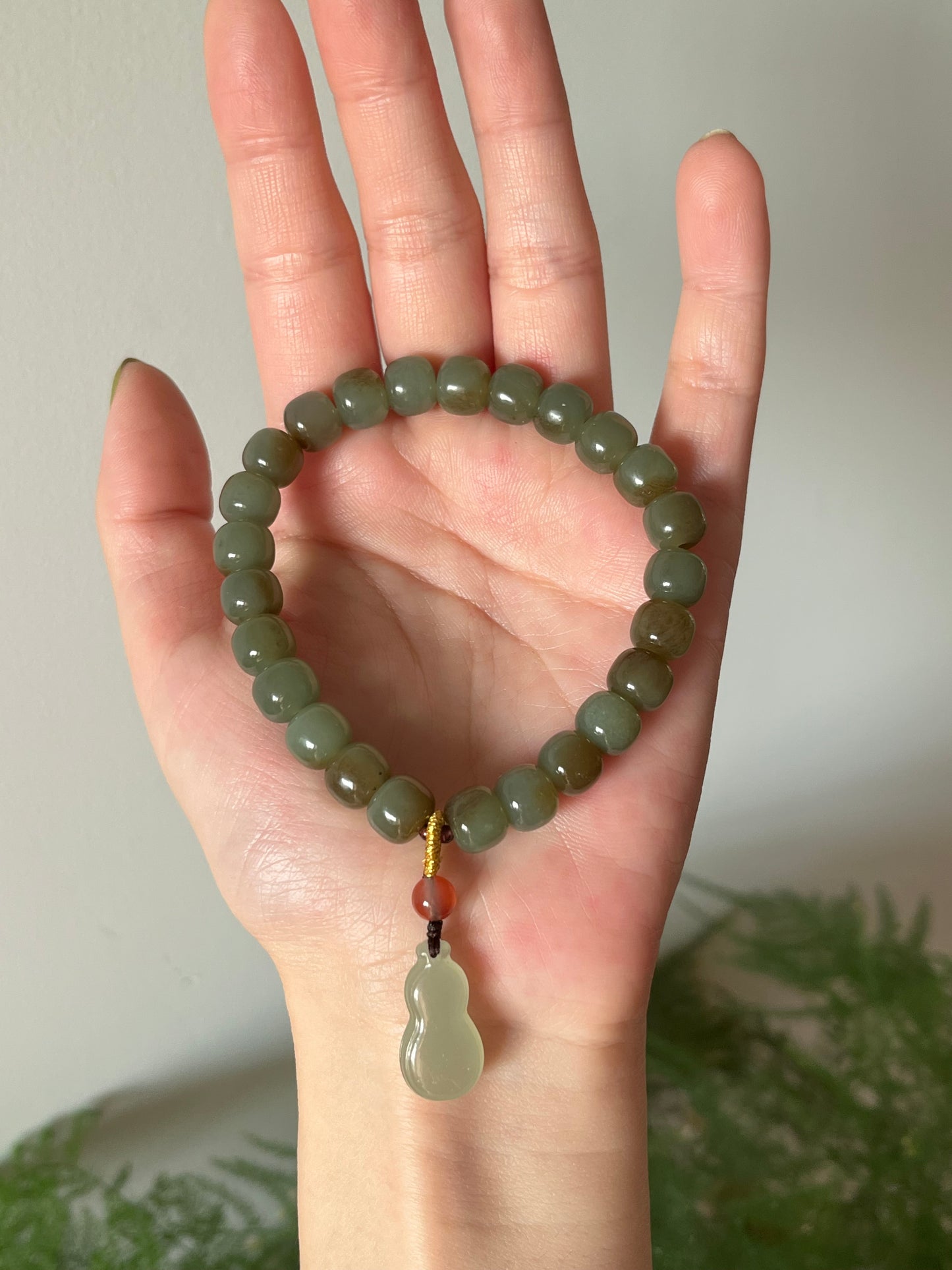 Blue and Brown Nephrite Jade Bracelet with 8mm x 6mm Barrel Beads and a Jade Hulu Pendant