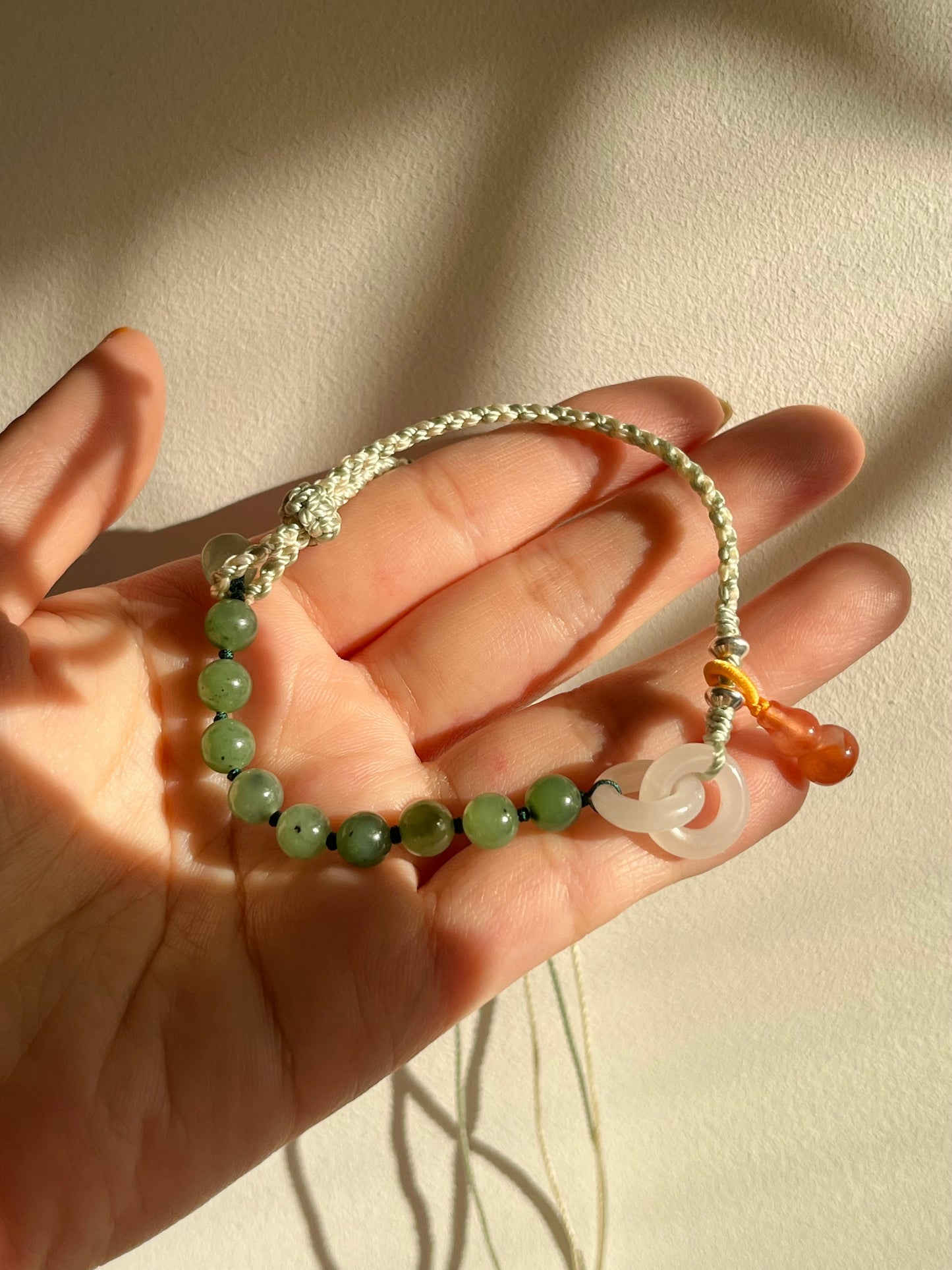 Handwoven Bracelet with Interlocking White Jade Rings, 手编和田白玉环环相扣手绳