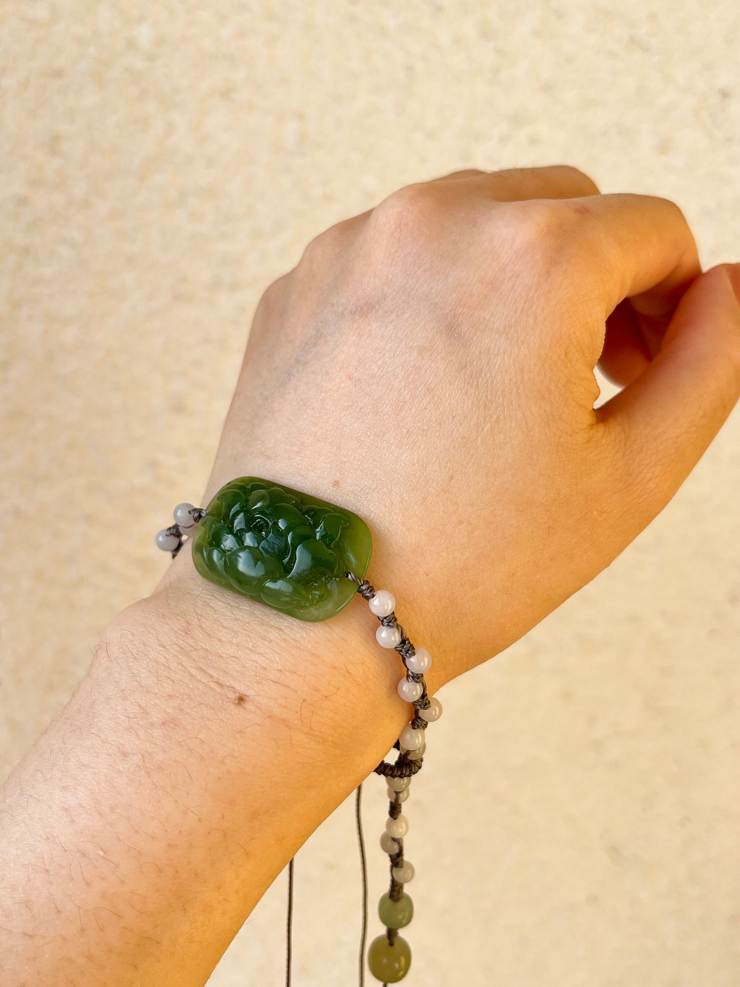 Hand-woven Charm Bracelet with a Hand Carved Green Jade Peony