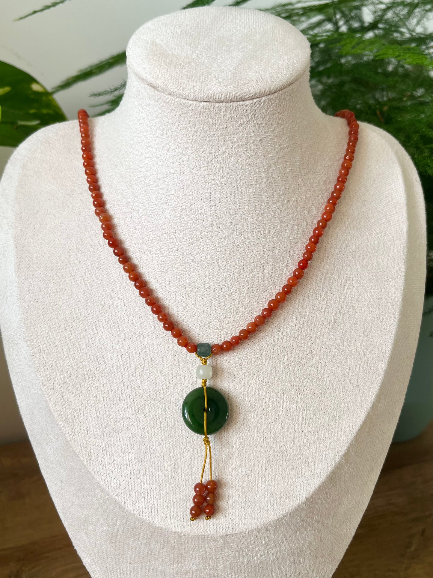 Multi-Function Three Loop Southern Red Agate Beaded Bracelet with a Green Jade PI pendant (ping an kou), 南红多圈手串加碧玉平安扣