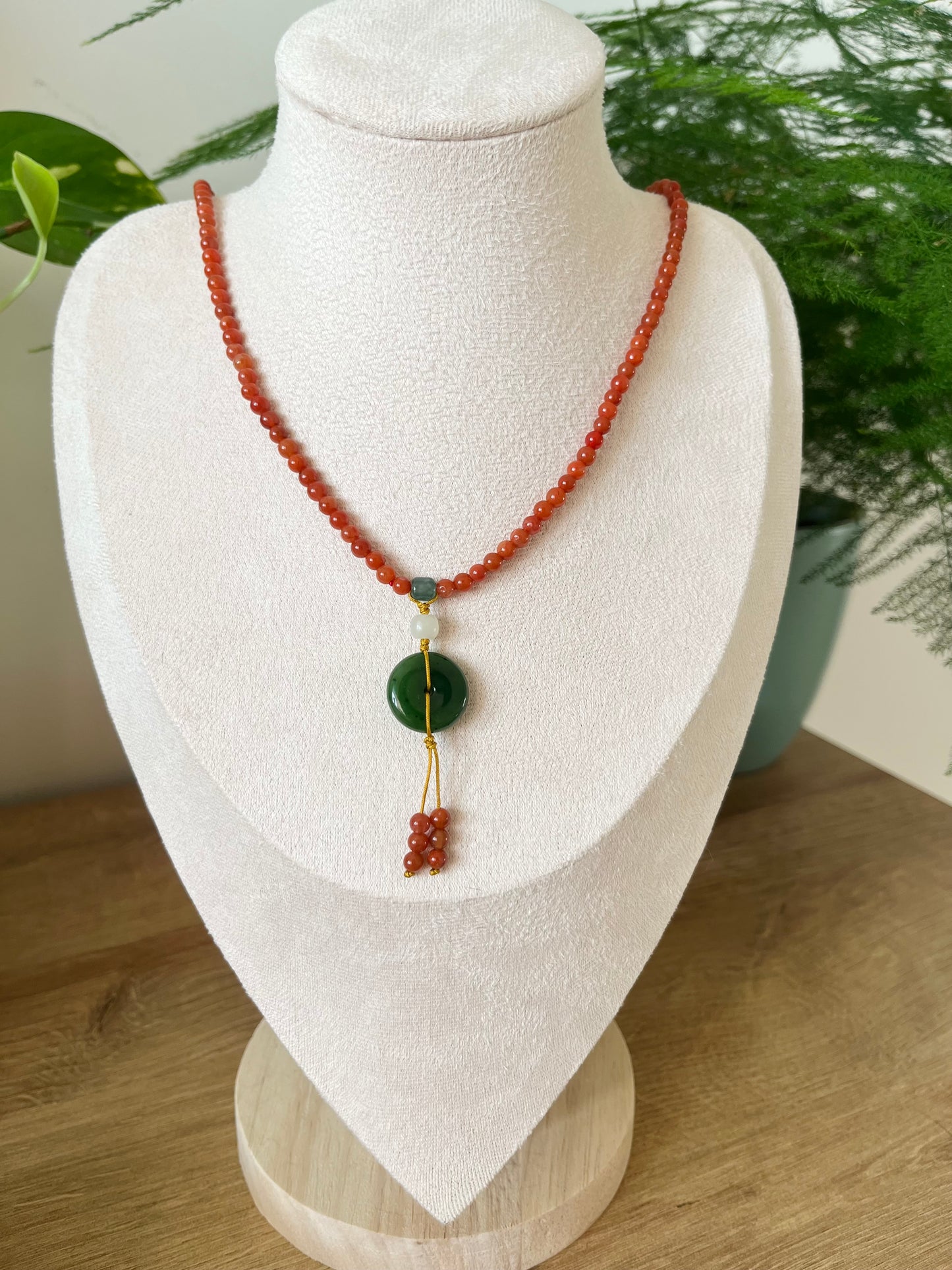 Multi-Function Three Loop Southern Red Agate Beaded Bracelet with a Green Jade PI pendant (ping an kou), 南红多圈手串加碧玉平安扣