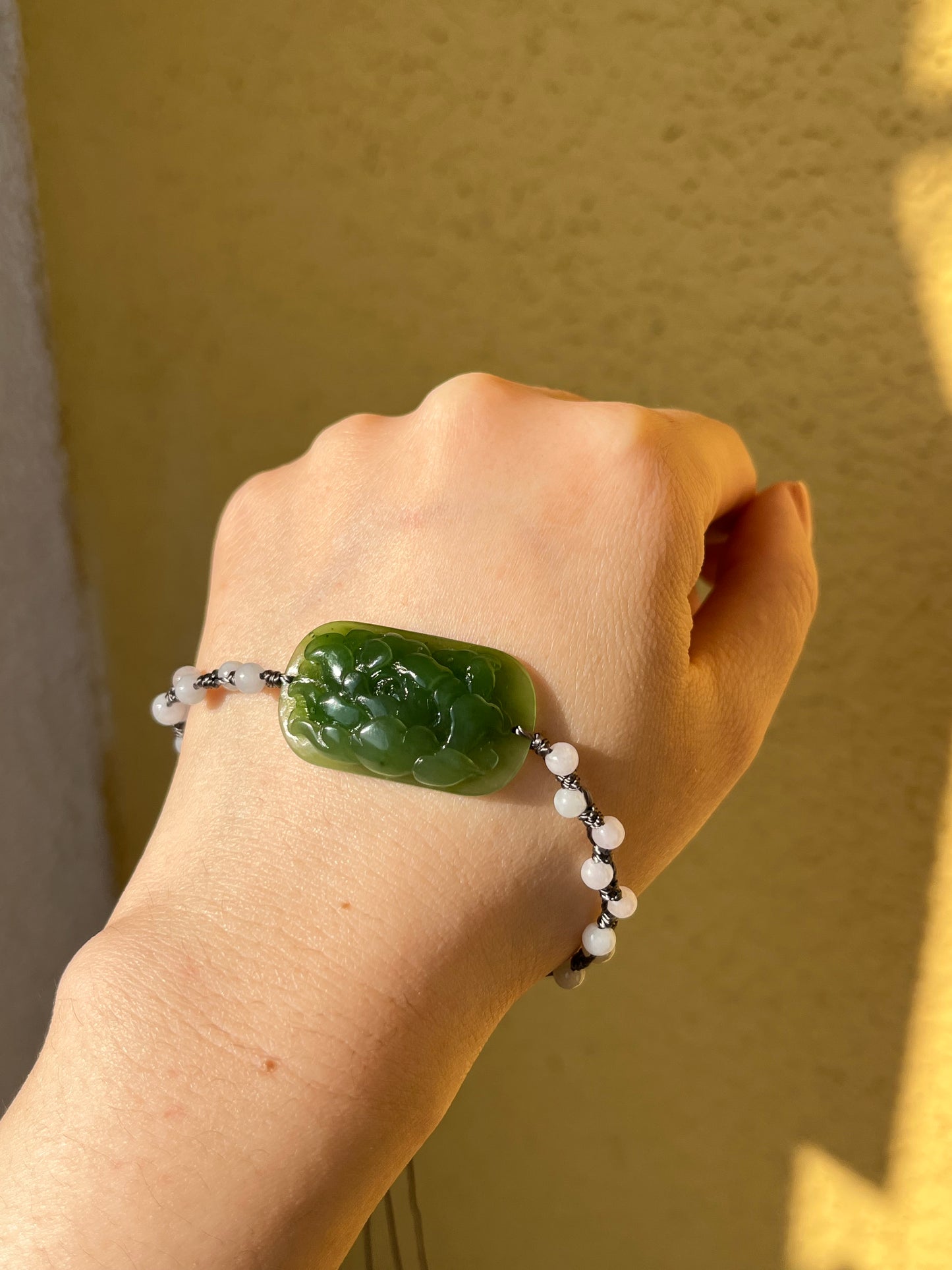 Hand-woven Charm Bracelet with a Hand Carved Green Jade Peony