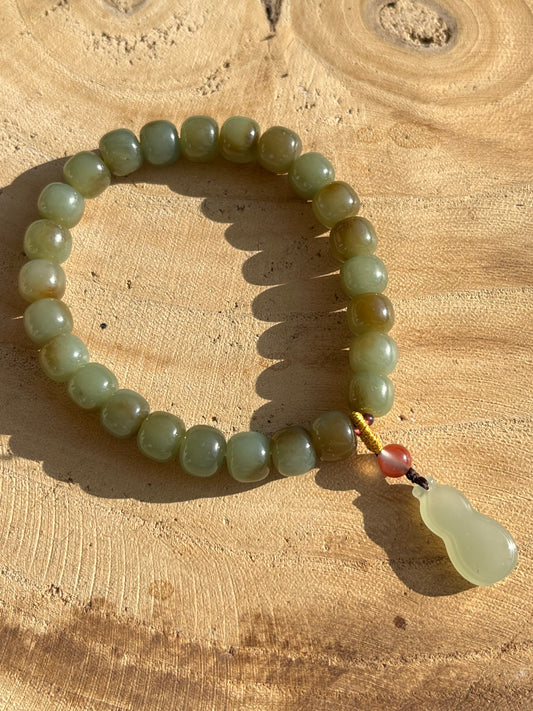 Blue and Brown Nephrite Jade Bracelet with 8mm x 6mm Barrel Beads and a Jade Hulu Pendant