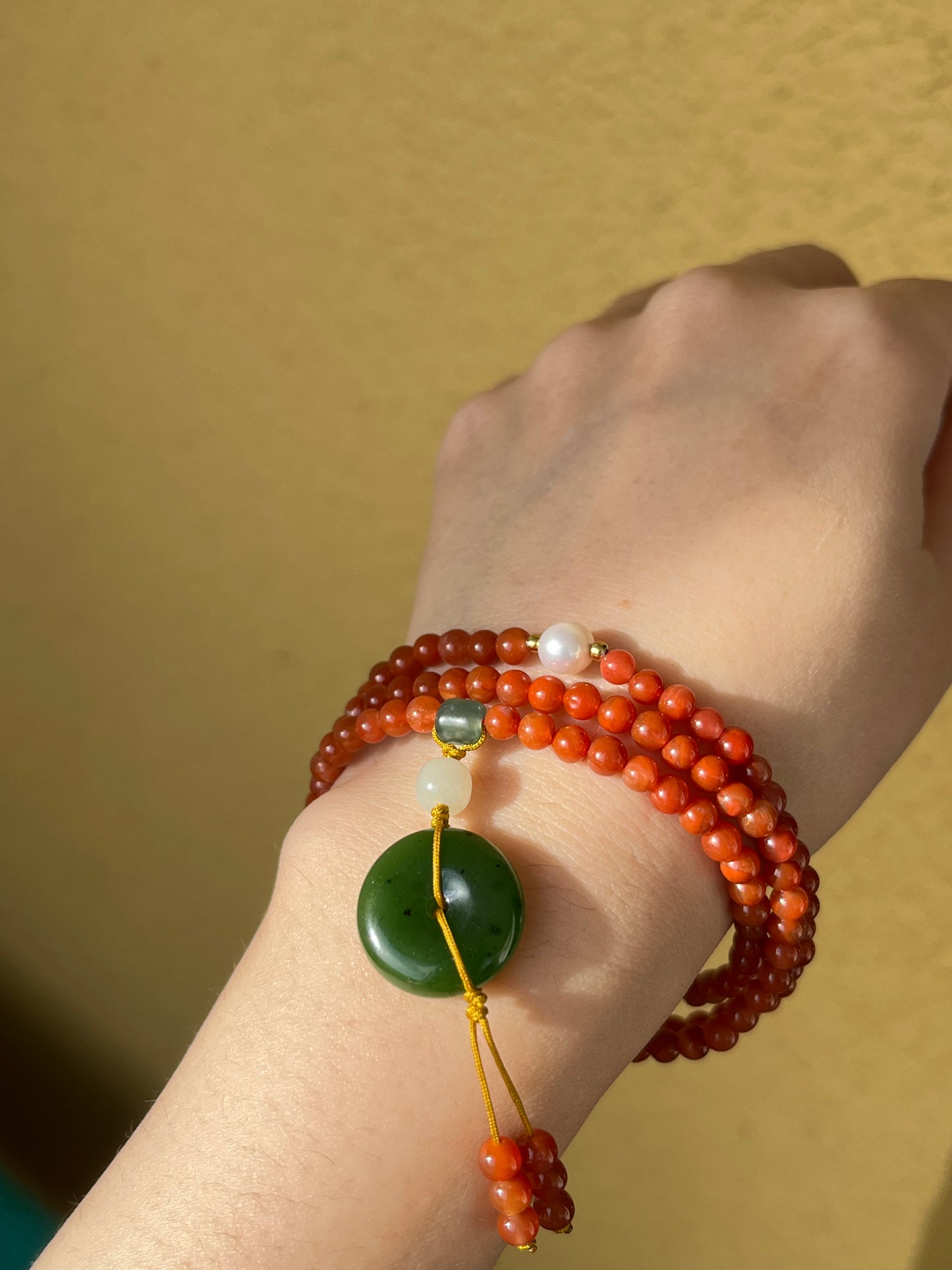 Multi-Function Three Loop Southern Red Agate Beaded Bracelet with a Green Jade PI pendant (ping an kou), 南红多圈手串加碧玉平安扣