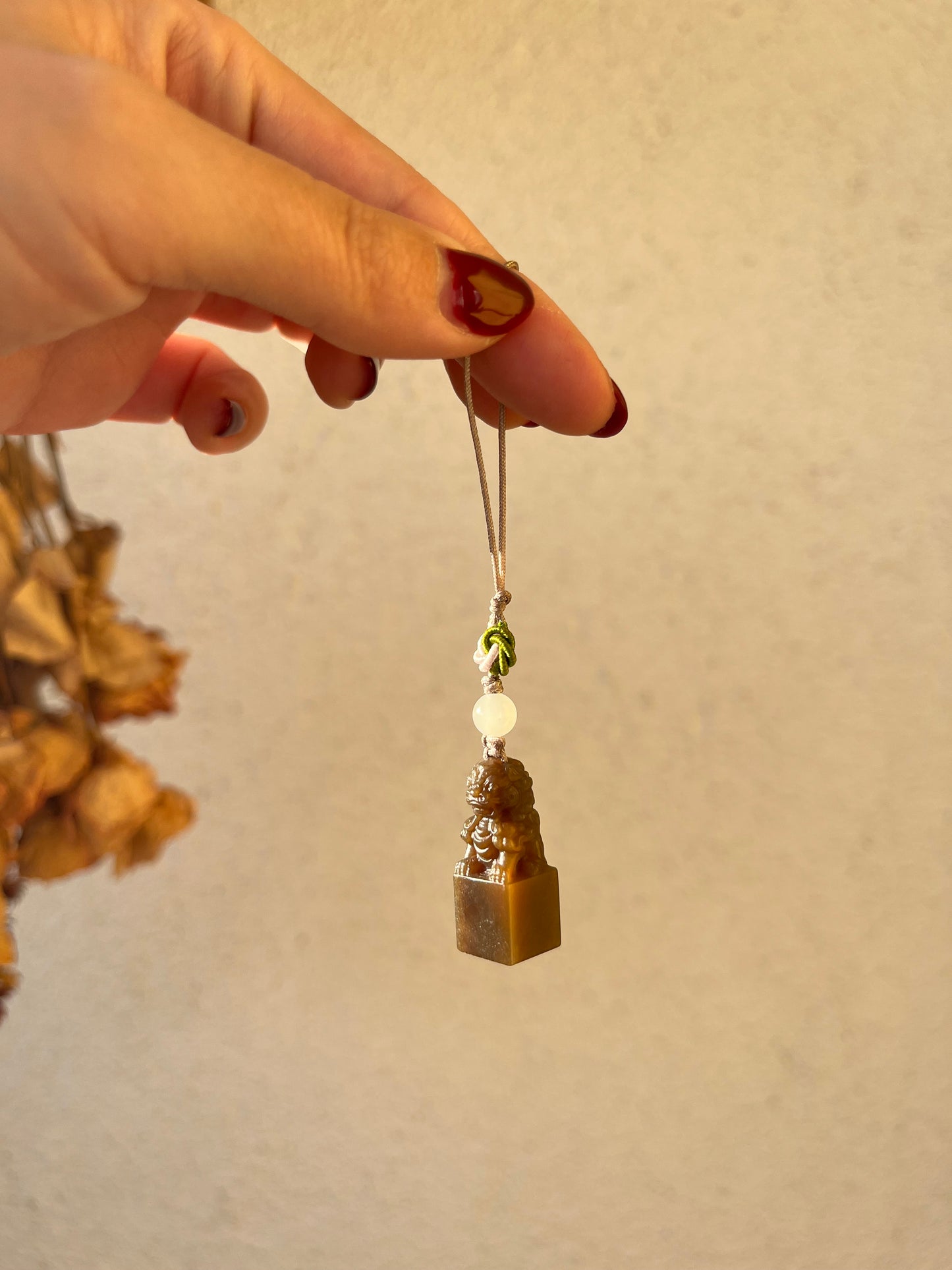 Handmade Phone Charm with a Hand Carved Brown Hetian Jade Lion，手雕和田糖玉狮子吊坠