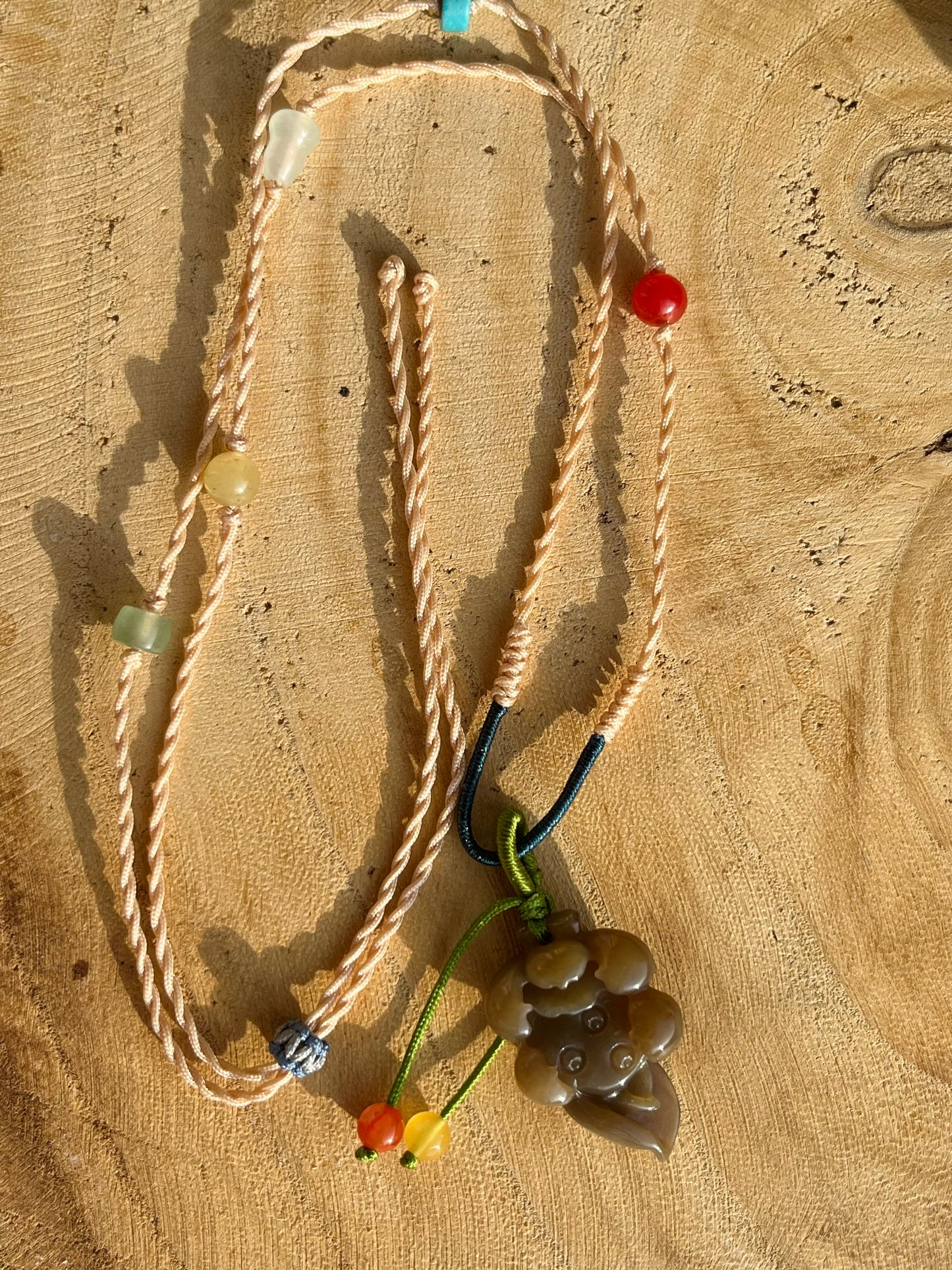 Handmade Necklace with a Hand Carved Brown Jade Lotus, 手编和田玉小荷花项链