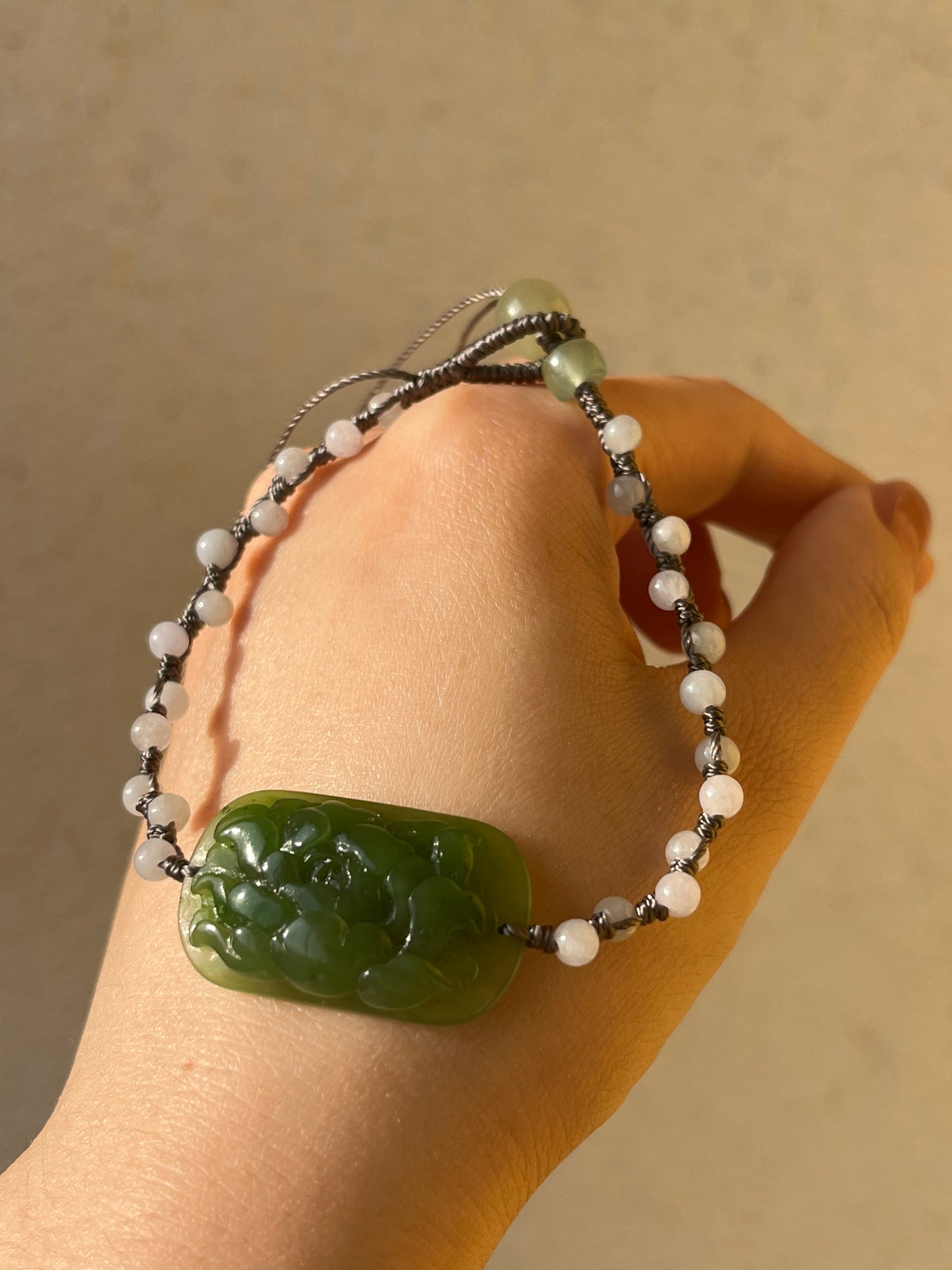 Hand-woven Charm Bracelet with a Hand Carved Green Jade Peony