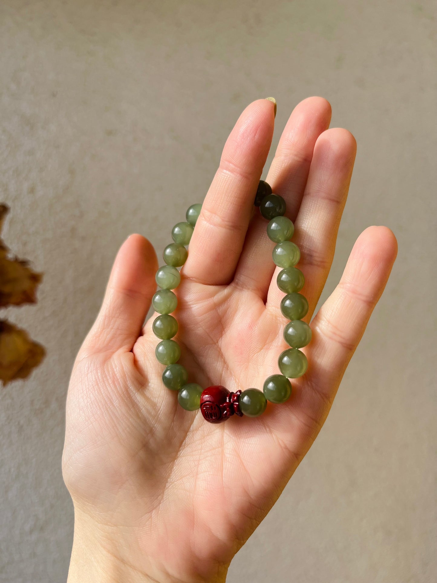 Bracelet with 8mm Icy Green Jade Beads and a Cinnabar Lucky Bag, 和田冰湖水绿珠加朱砂福袋手串