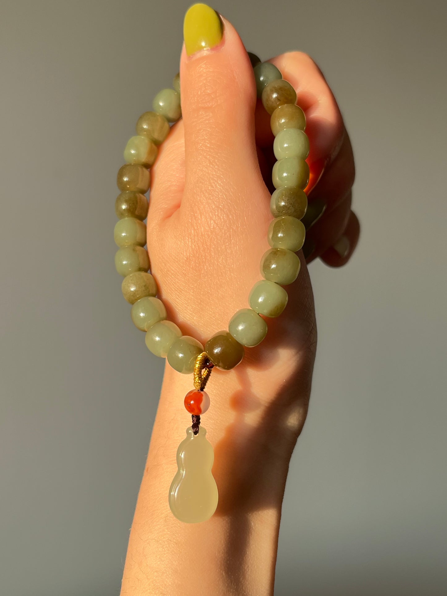 Blue and Brown Nephrite Jade Bracelet with 8mm x 6mm Barrel Beads and a Jade Hulu Pendant