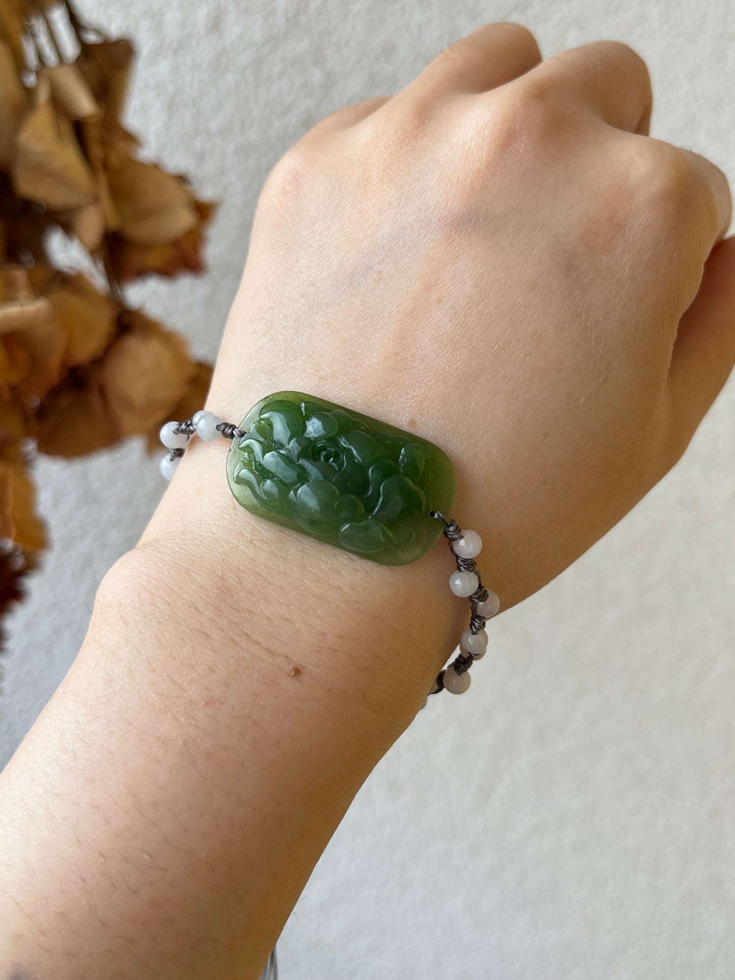 Hand-woven Charm Bracelet with a Hand Carved Green Jade Peony