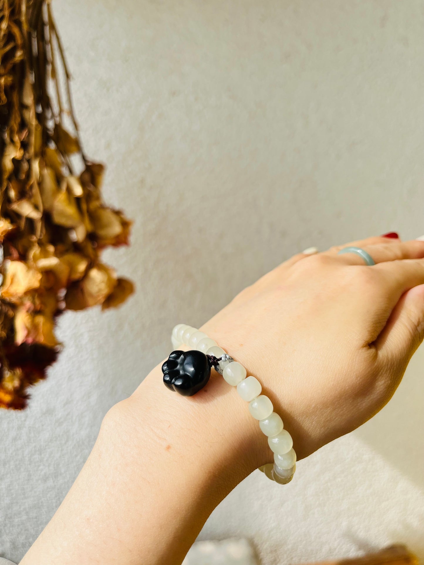 White Jade Bracelet with 6mm x 4mm Beads and a Cute Black Jade Cat Paw