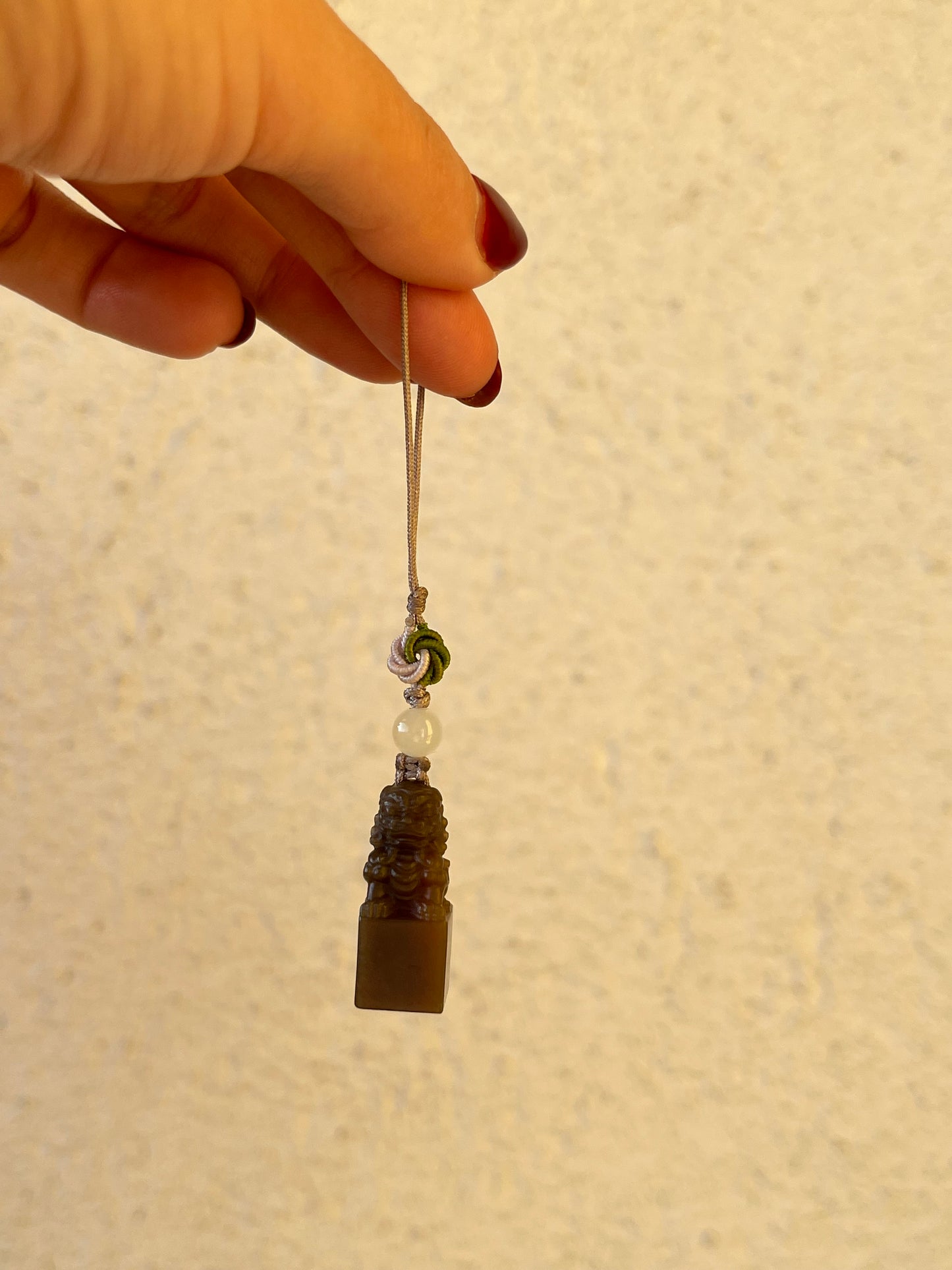 Handmade Phone Charm with a Hand Carved Brown Hetian Jade Lion，手雕和田糖玉狮子吊坠