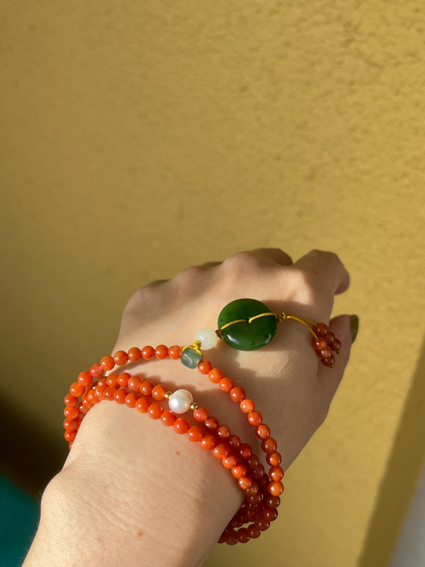 Multi-Function Three Loop Southern Red Agate Beaded Bracelet with a Green Jade PI pendant (ping an kou), 南红多圈手串加碧玉平安扣