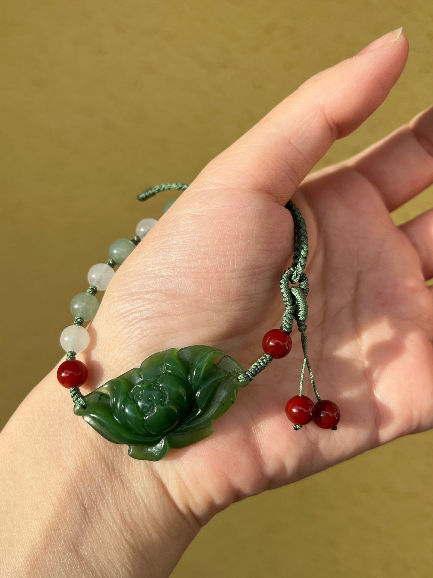 Handwoven Bracelet with a Handcarved Green Jade Lotus Flower, 手编和田碧玉莲花手牌