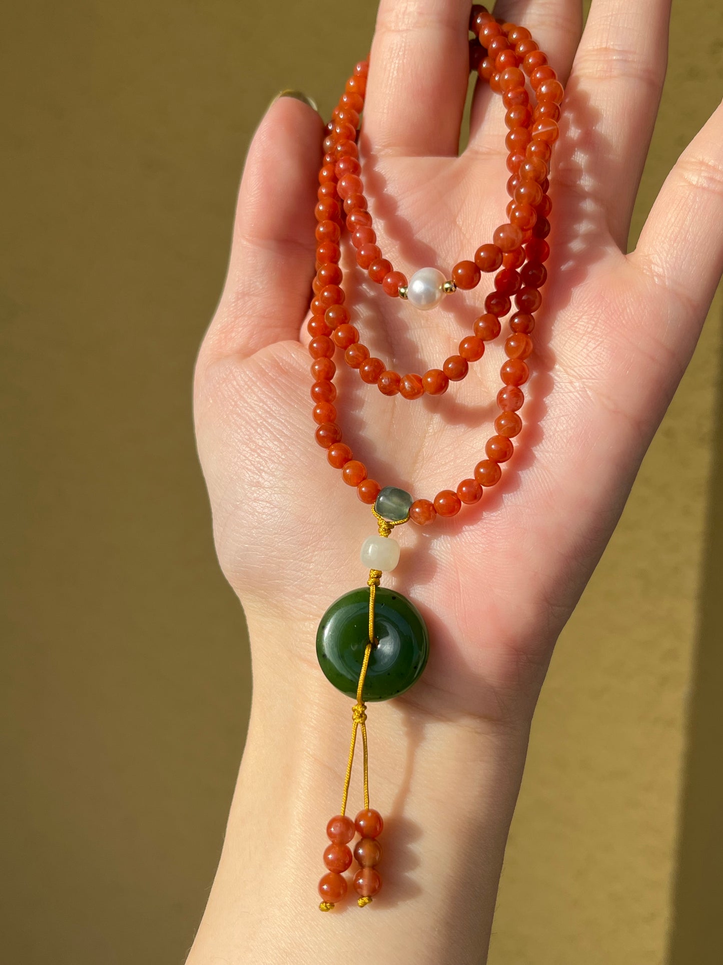 Multi-Function Three Loop Southern Red Agate Beaded Bracelet with a Green Jade PI pendant (ping an kou), 南红多圈手串加碧玉平安扣