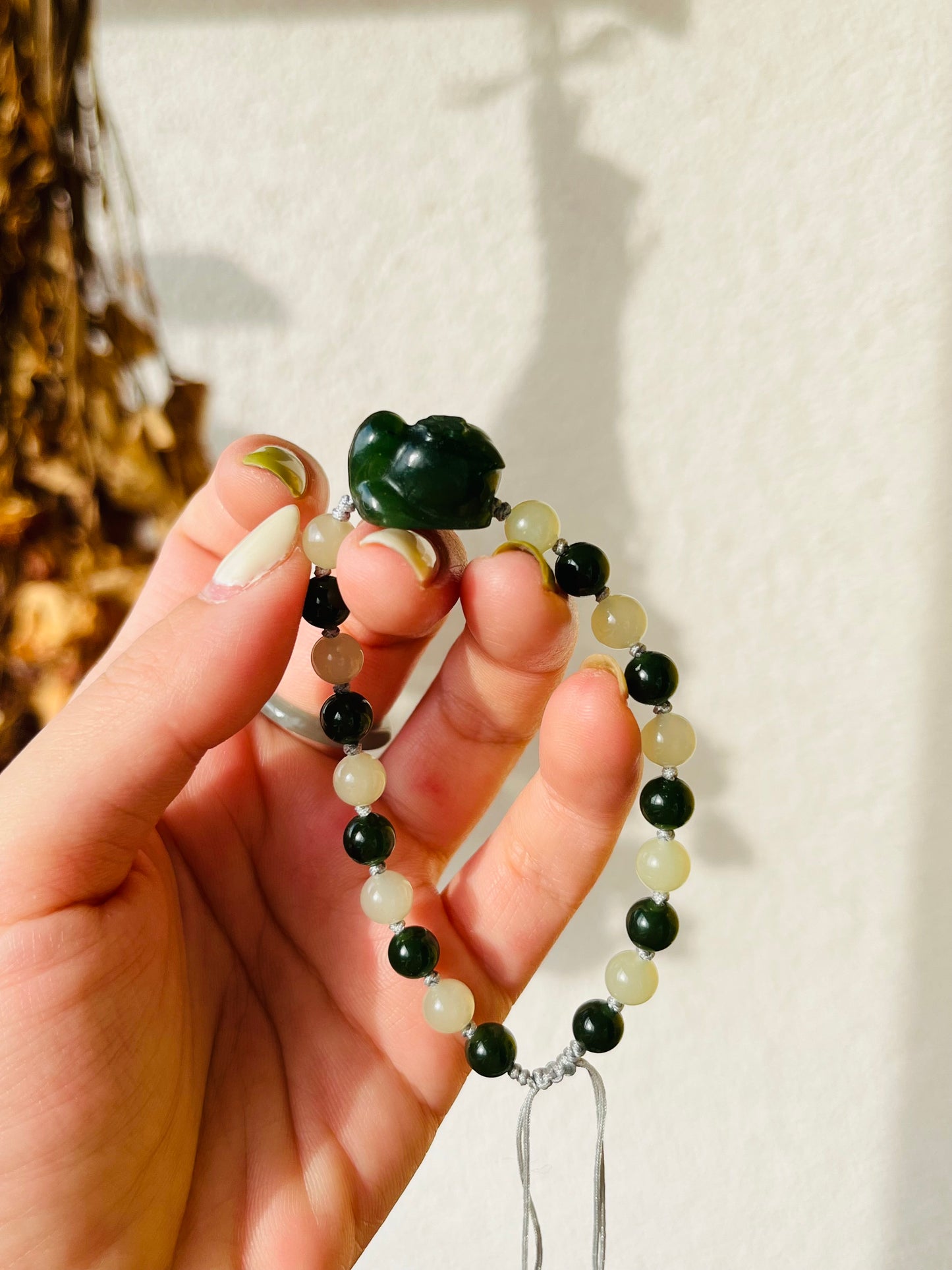 Handmade Bracelet with 6mm Green and Yellow Jade Beads and Hand Carved Cat