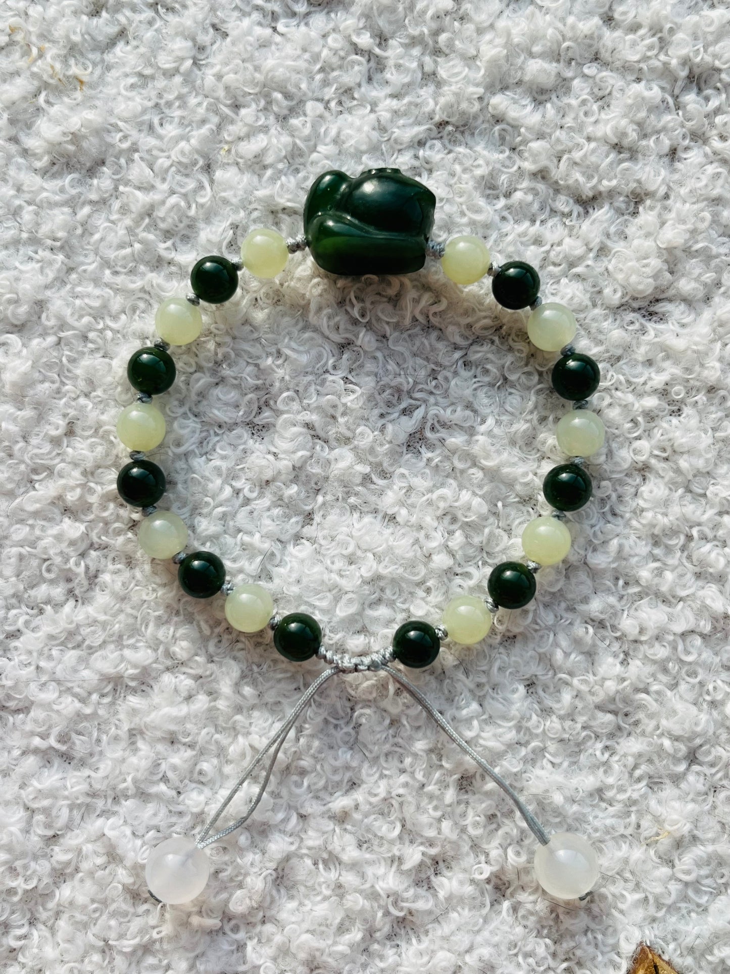 Handmade Bracelet with 6mm Green and Yellow Jade Beads and Hand Carved Cat