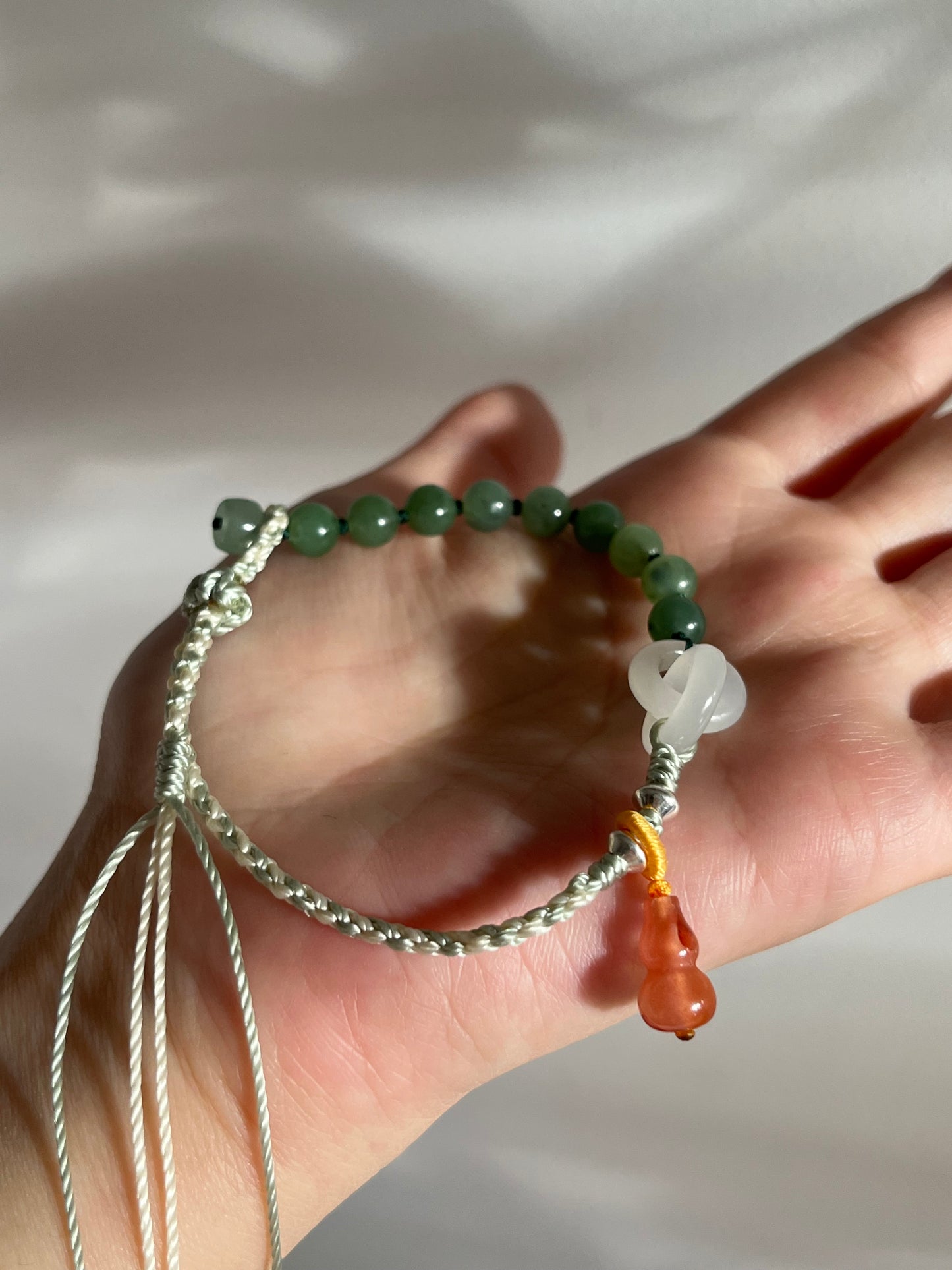 Handwoven Bracelet with Interlocking White Jade Rings, 手编和田白玉环环相扣手绳