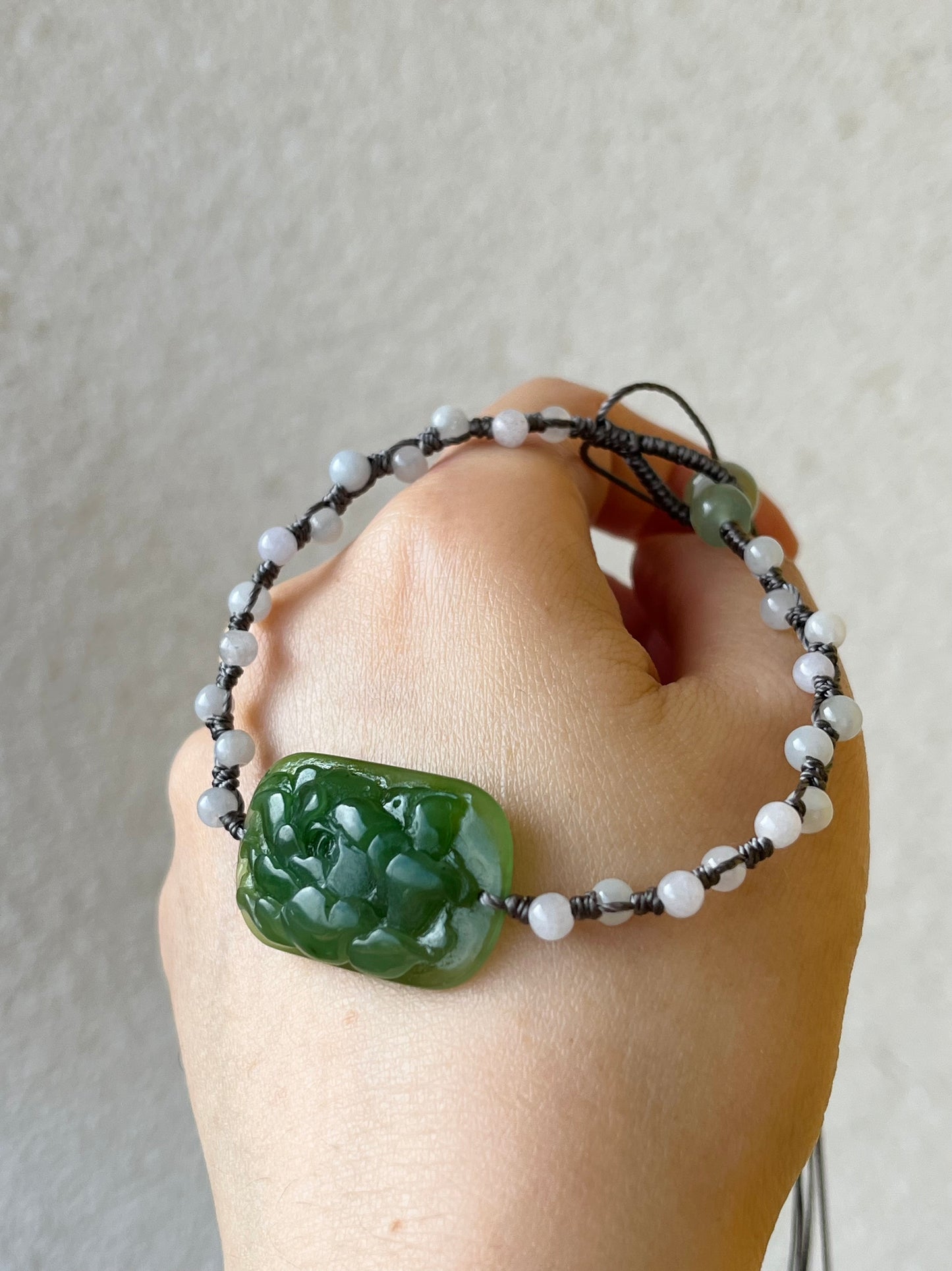 Hand-woven Charm Bracelet with a Hand Carved Green Jade Peony