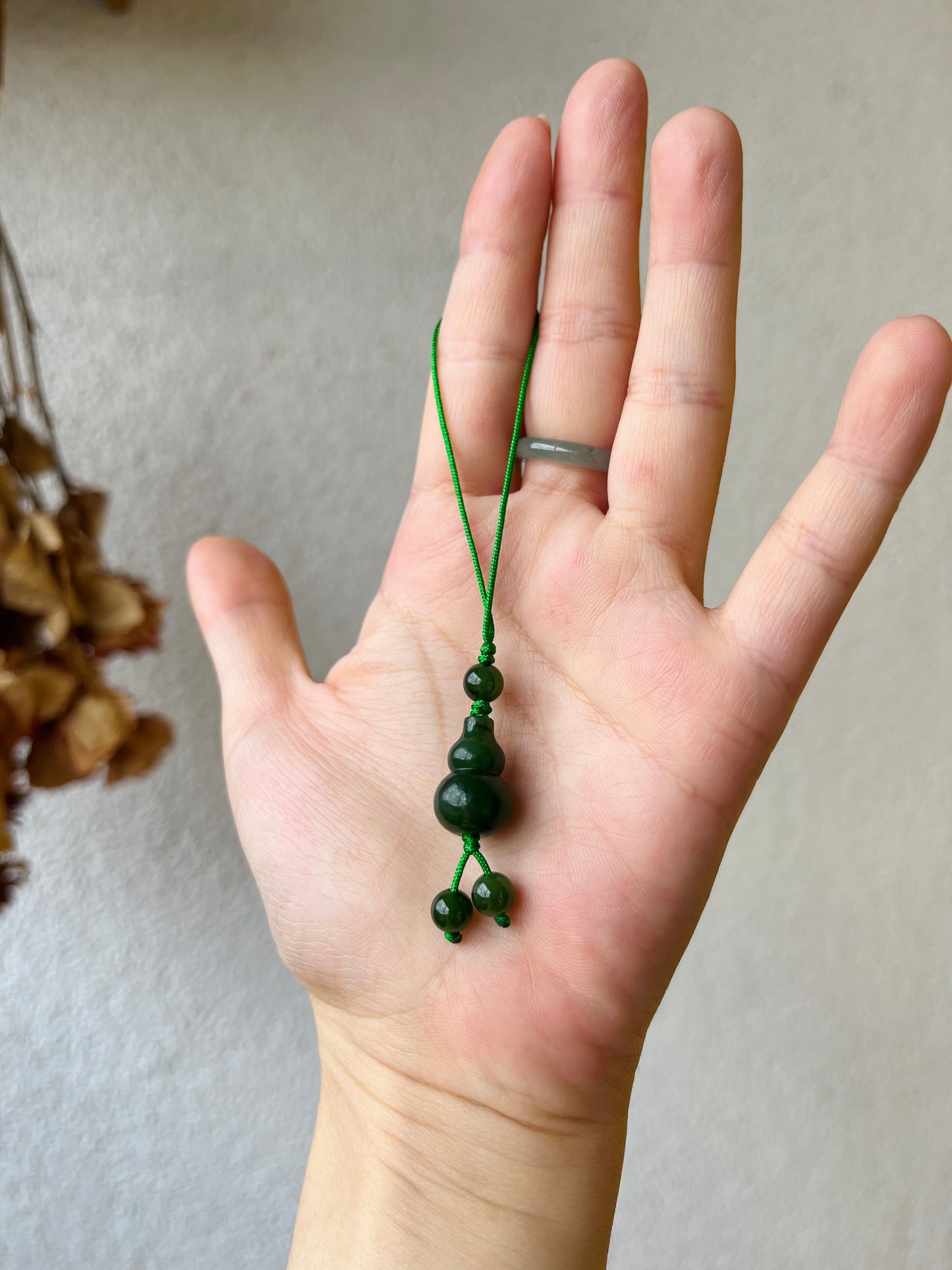 Handmade Phone Charm with a Carved Hulu