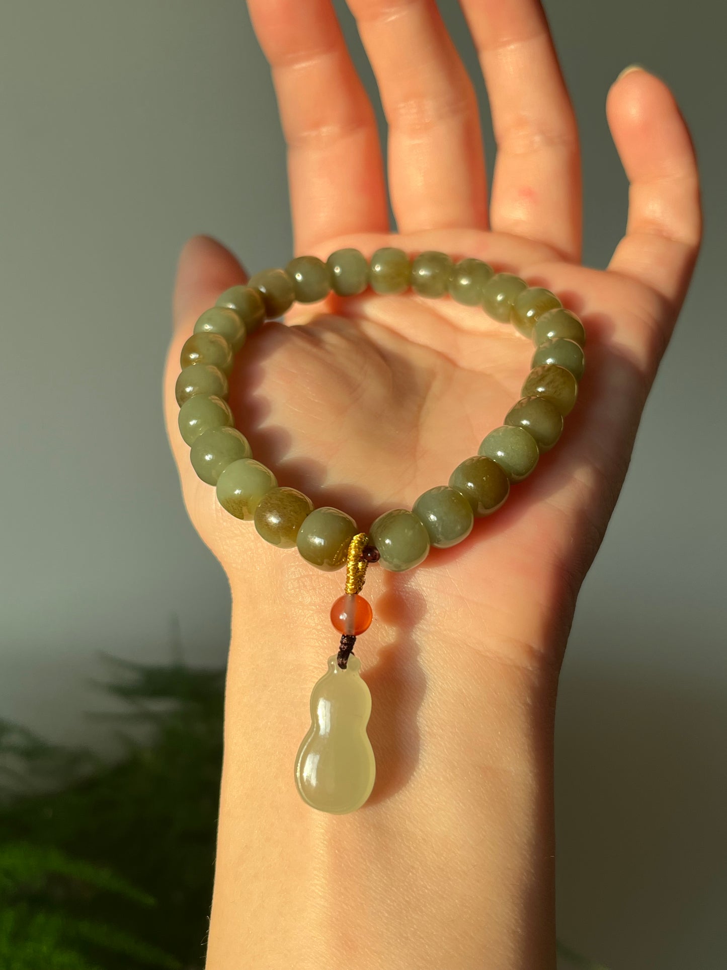 Blue and Brown Nephrite Jade Bracelet with 8mm x 6mm Barrel Beads and a Jade Hulu Pendant