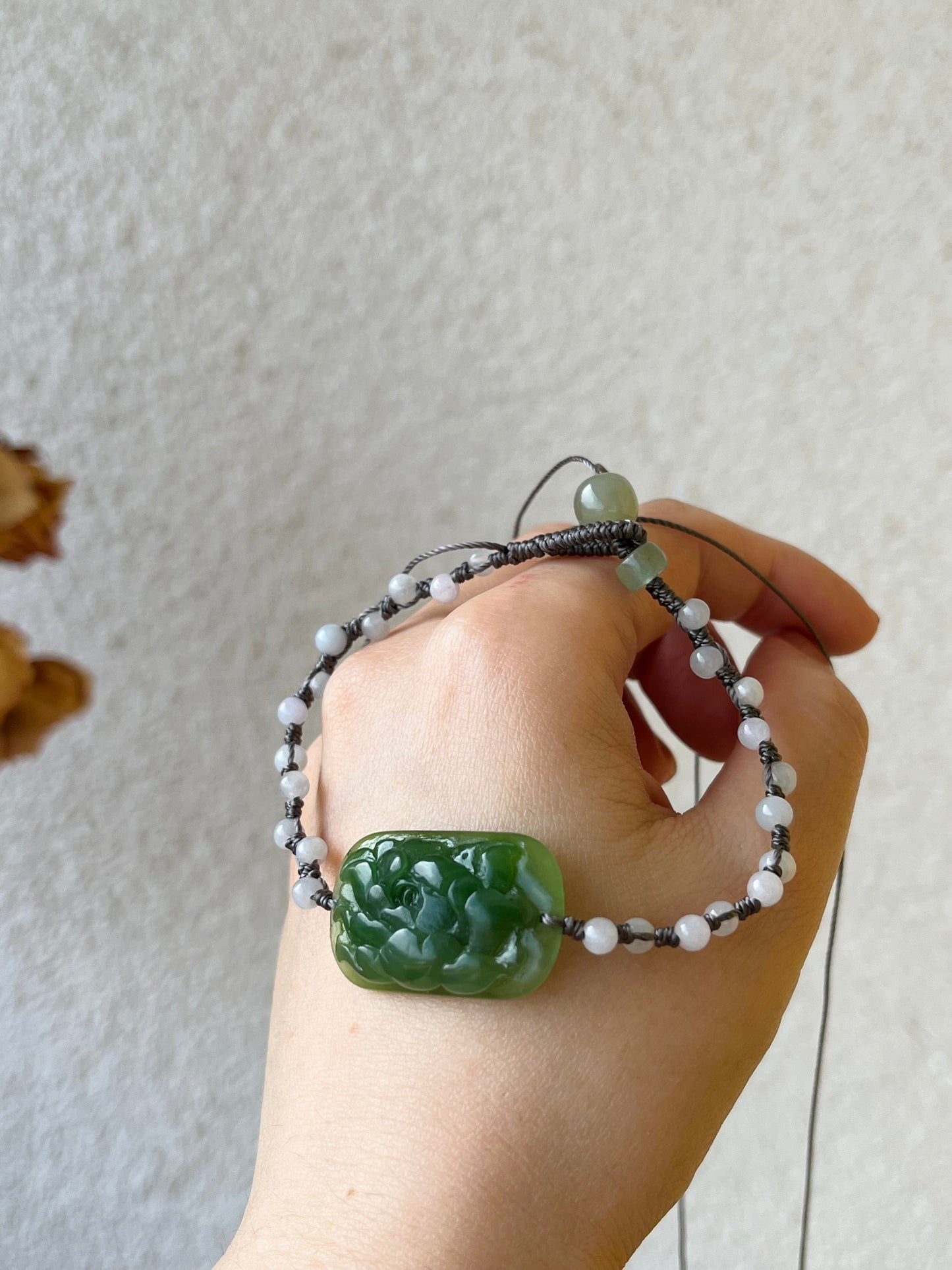 Hand-woven Charm Bracelet with a Hand Carved Green Jade Peony