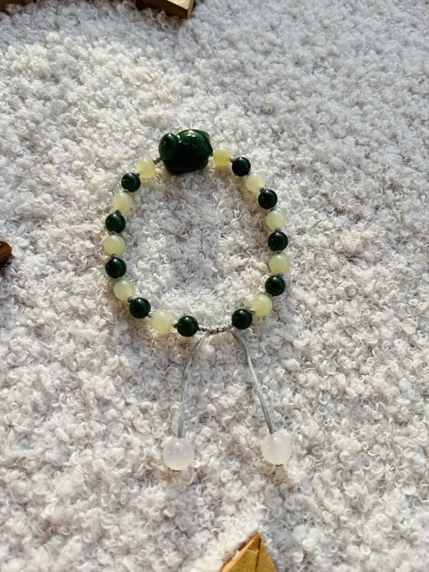 Handmade Bracelet with 6mm Green and Yellow Jade Beads and Hand Carved Cat