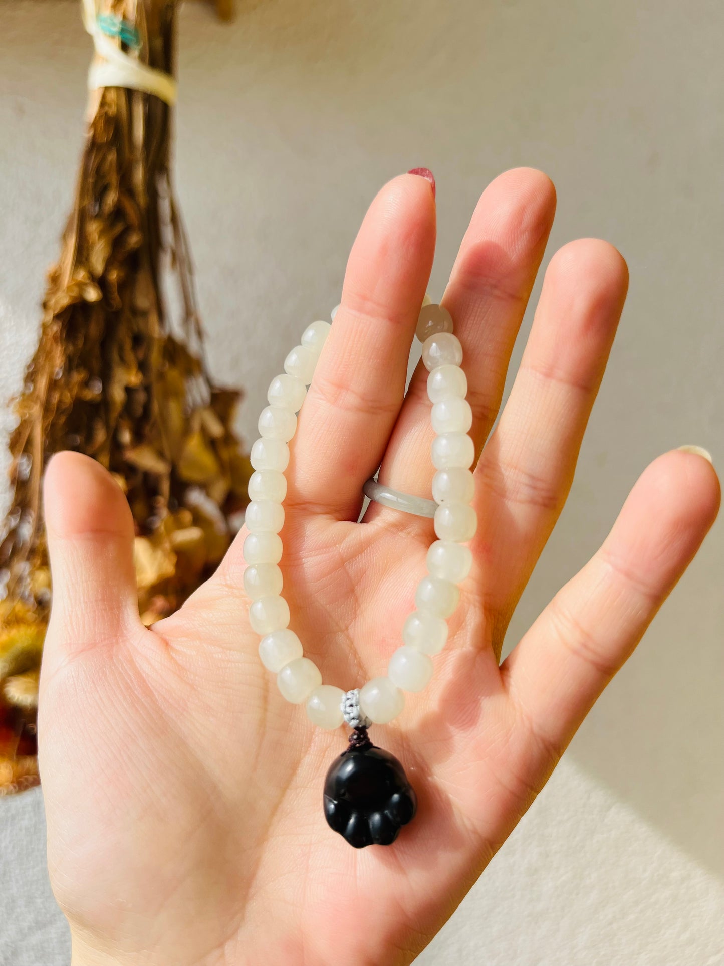 White Jade Bracelet with 6mm x 4mm Beads and a Cute Black Jade Cat Paw