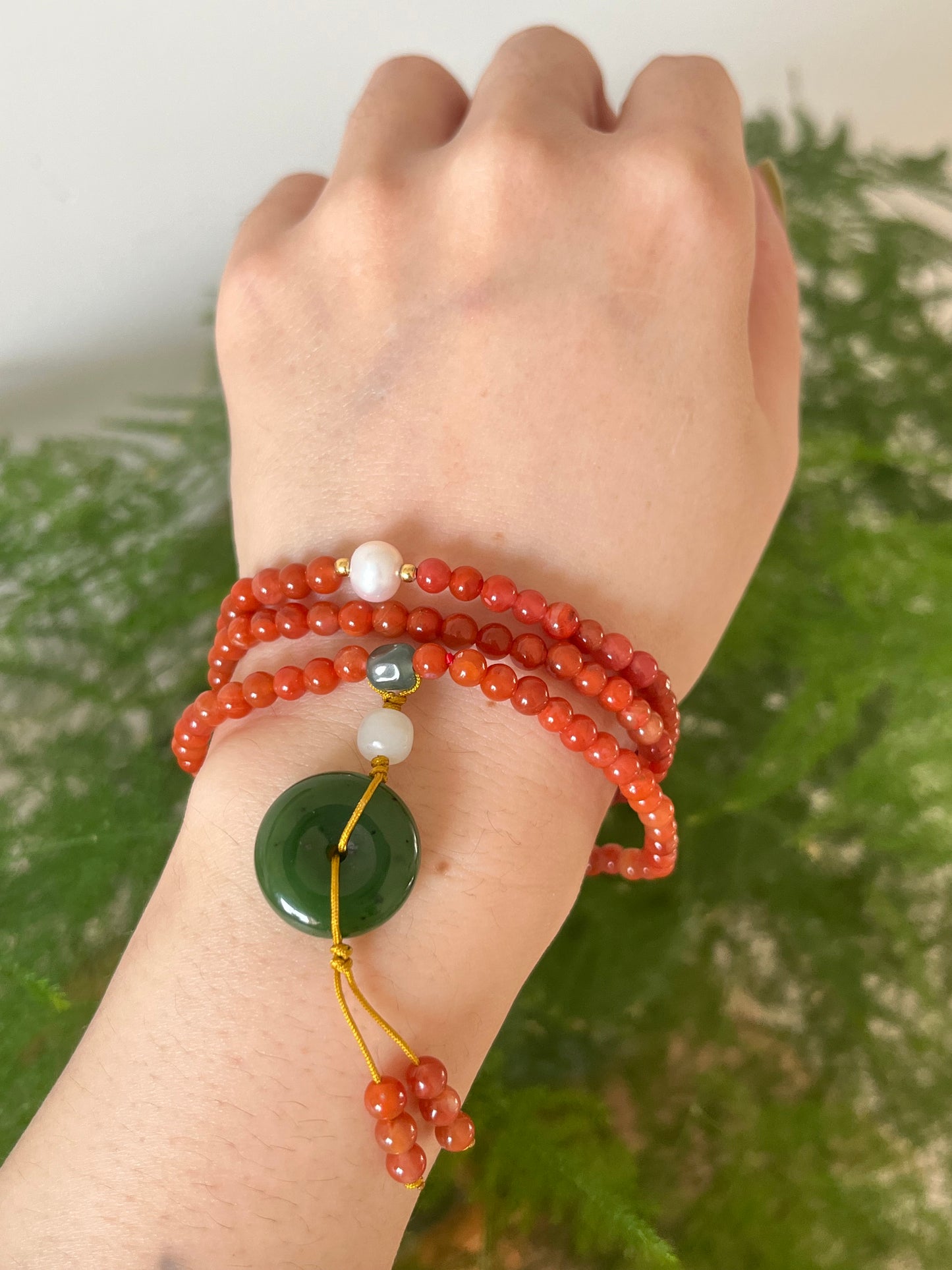 Multi-Function Three Loop Southern Red Agate Beaded Bracelet with a Green Jade PI pendant (ping an kou), 南红多圈手串加碧玉平安扣