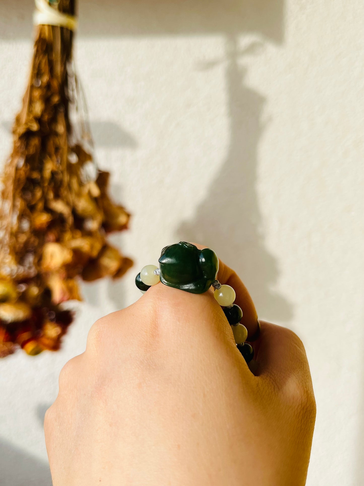 Handmade Bracelet with 6mm Green and Yellow Jade Beads and Hand Carved Cat