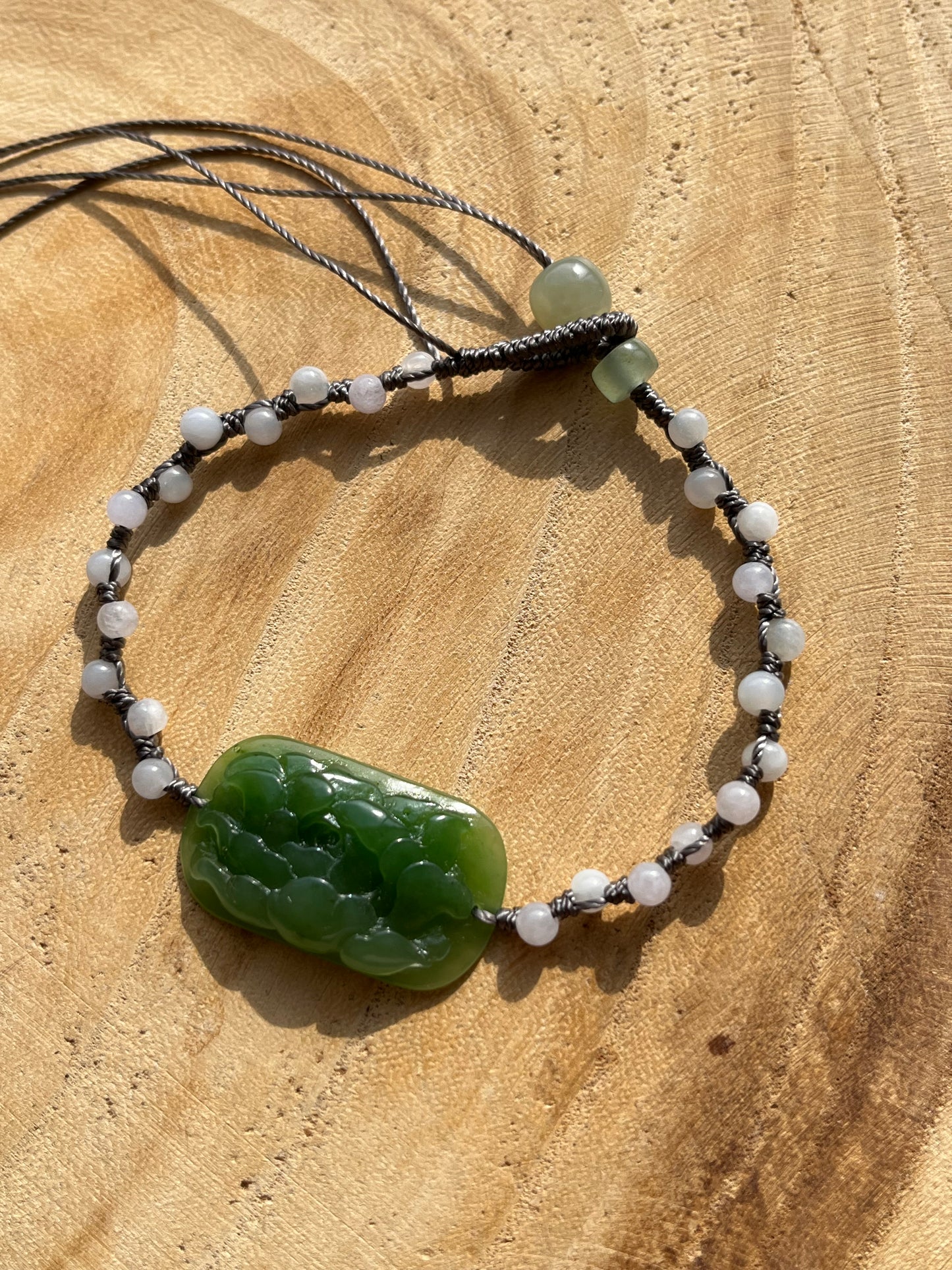 Hand-woven Charm Bracelet with a Hand Carved Green Jade Peony